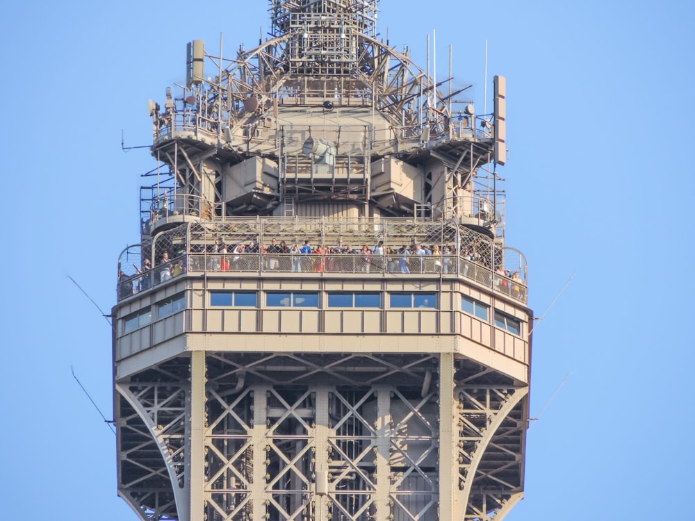 a tall tower with people on it