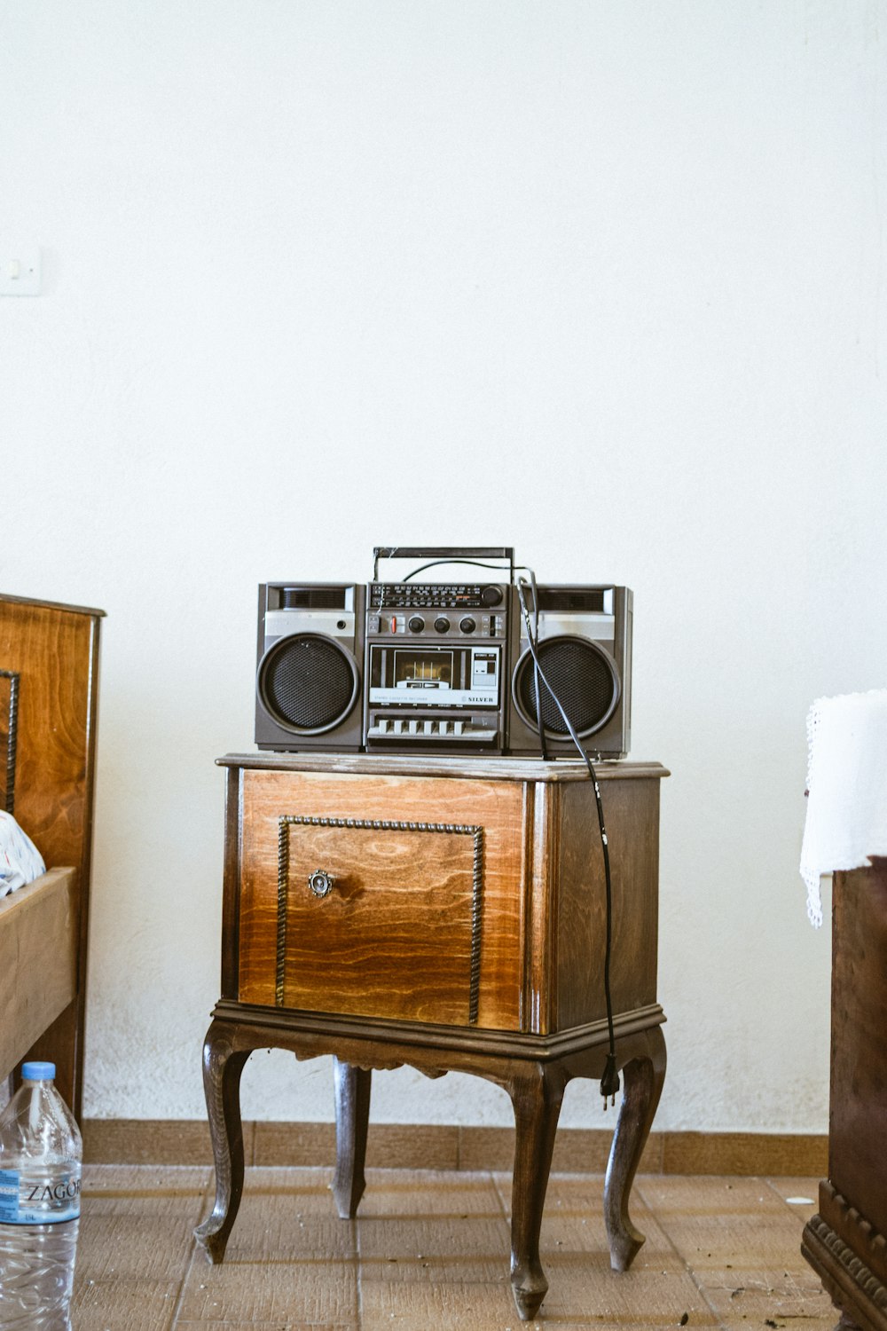 a living area with wooden wheels in a room