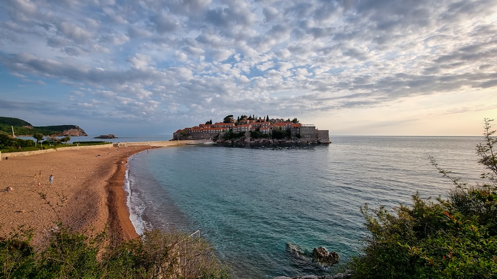 a beach with a building on it