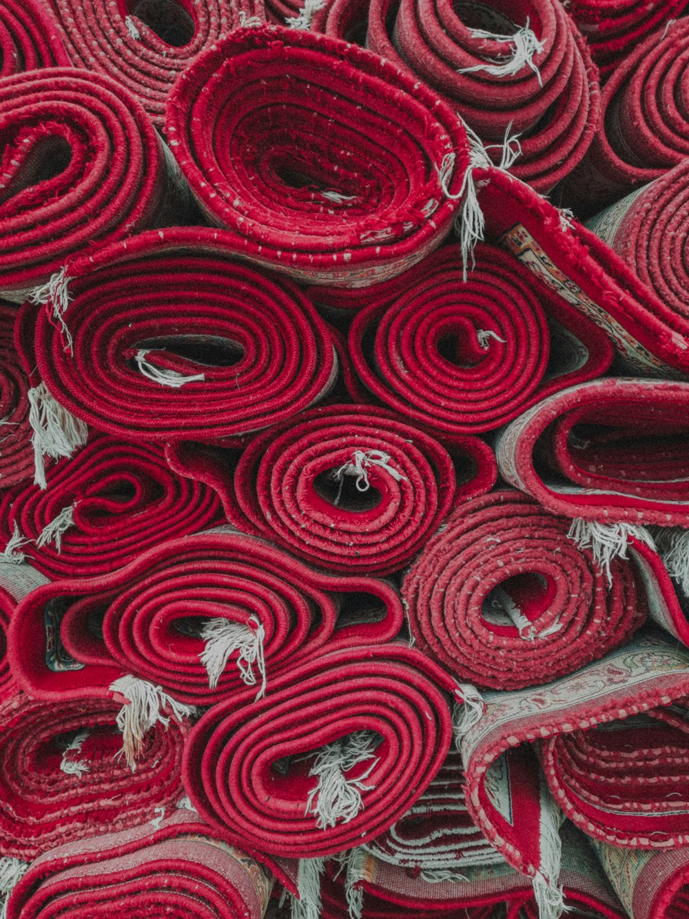 a pile of red and black fabric