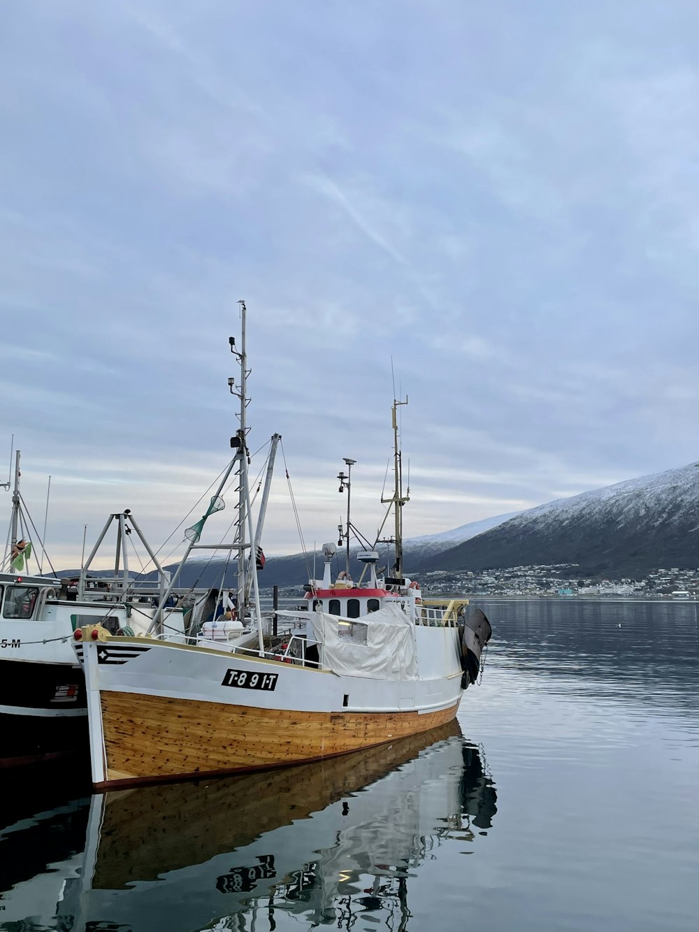 a boat is parked in the water