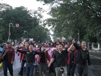 a group of people walking down a street