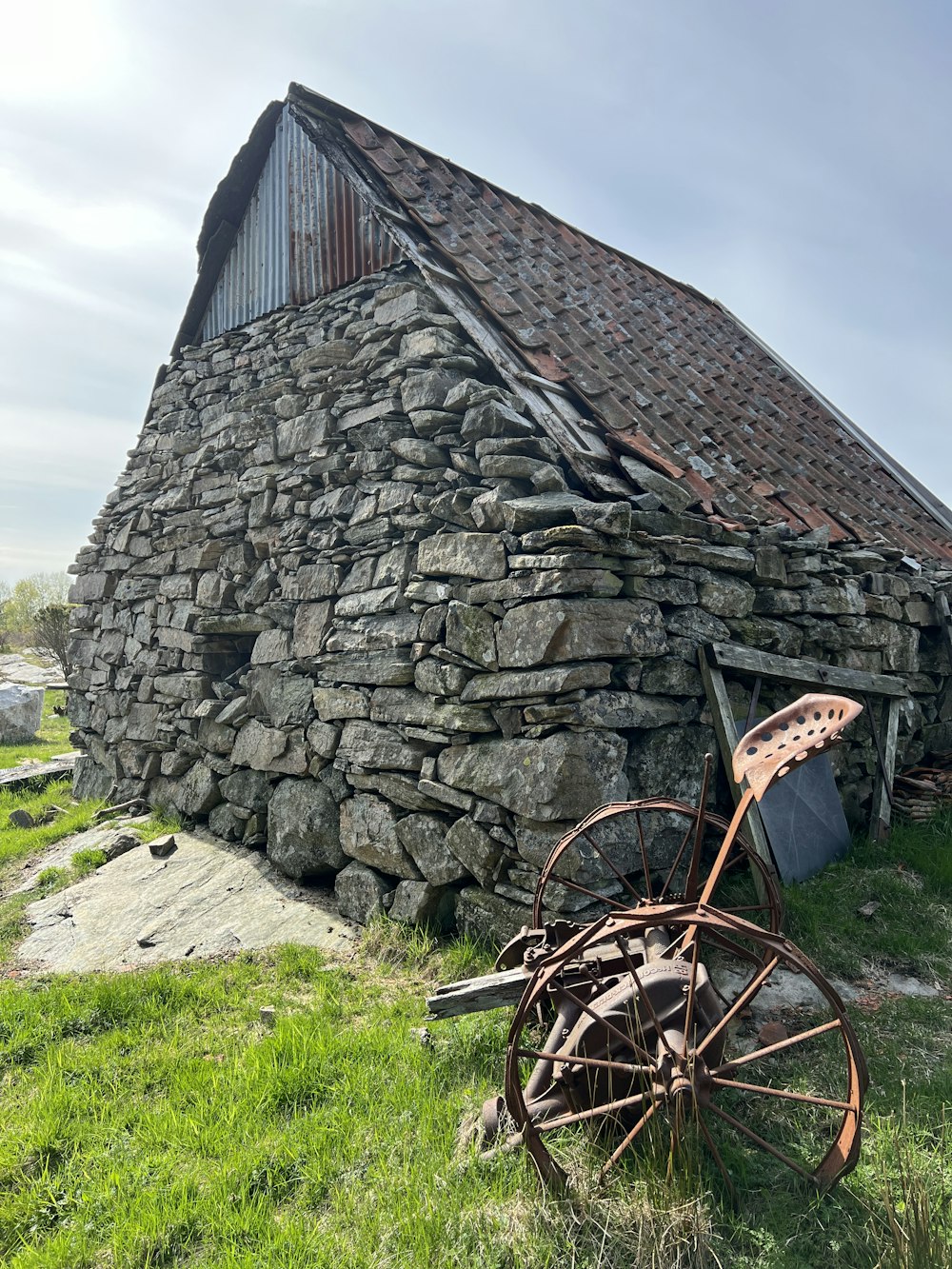 a stone building with a cannon in front of it