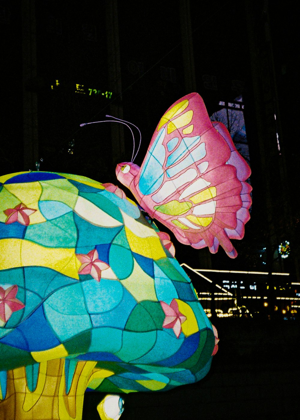 a colorful bag with a butterfly design