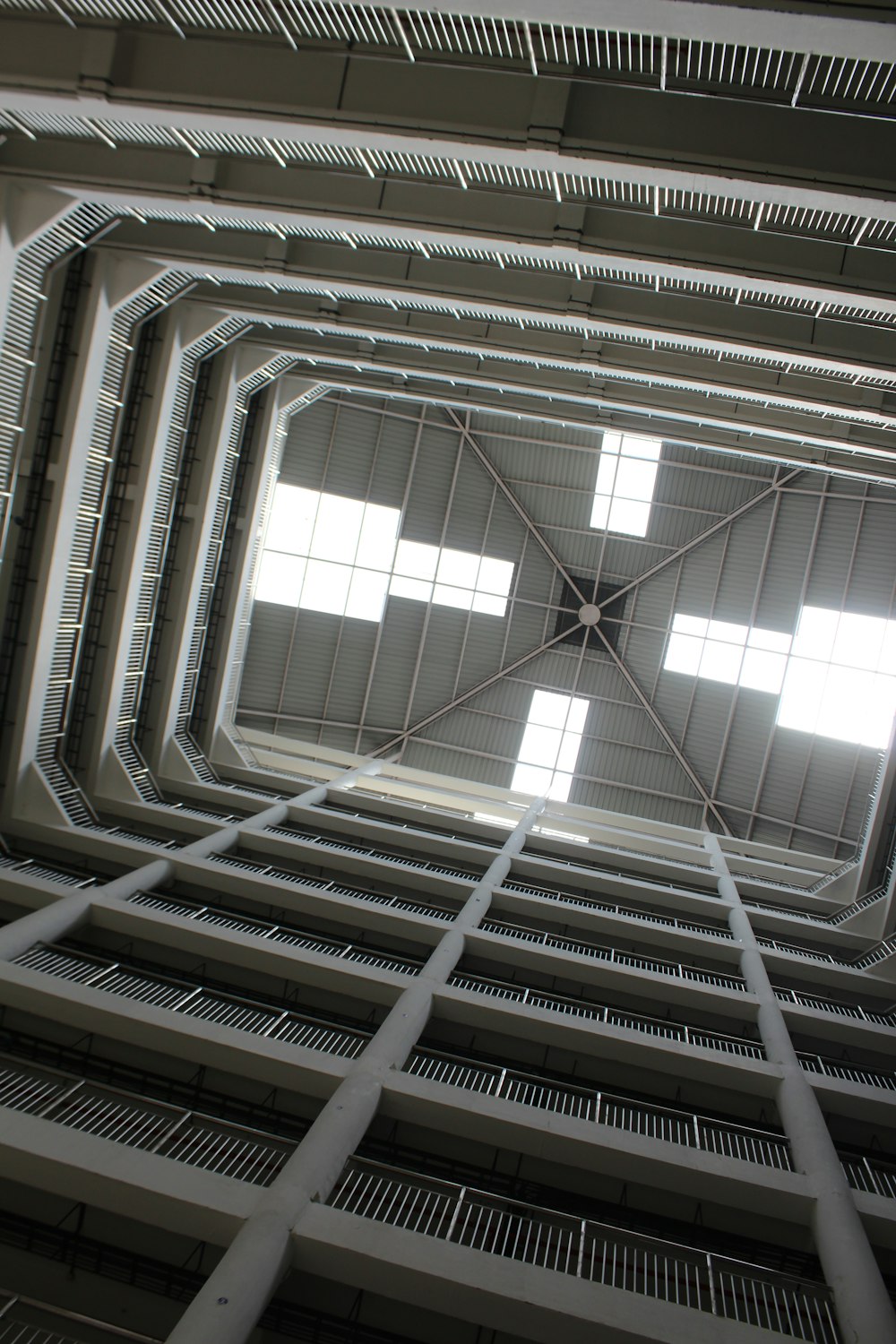 a room with a ceiling and windows