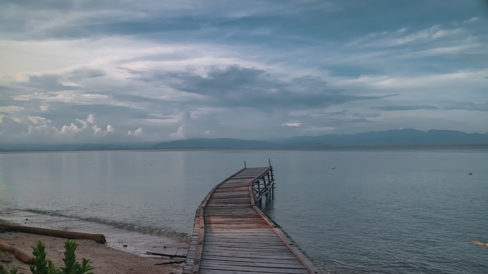 a wooden dock over water