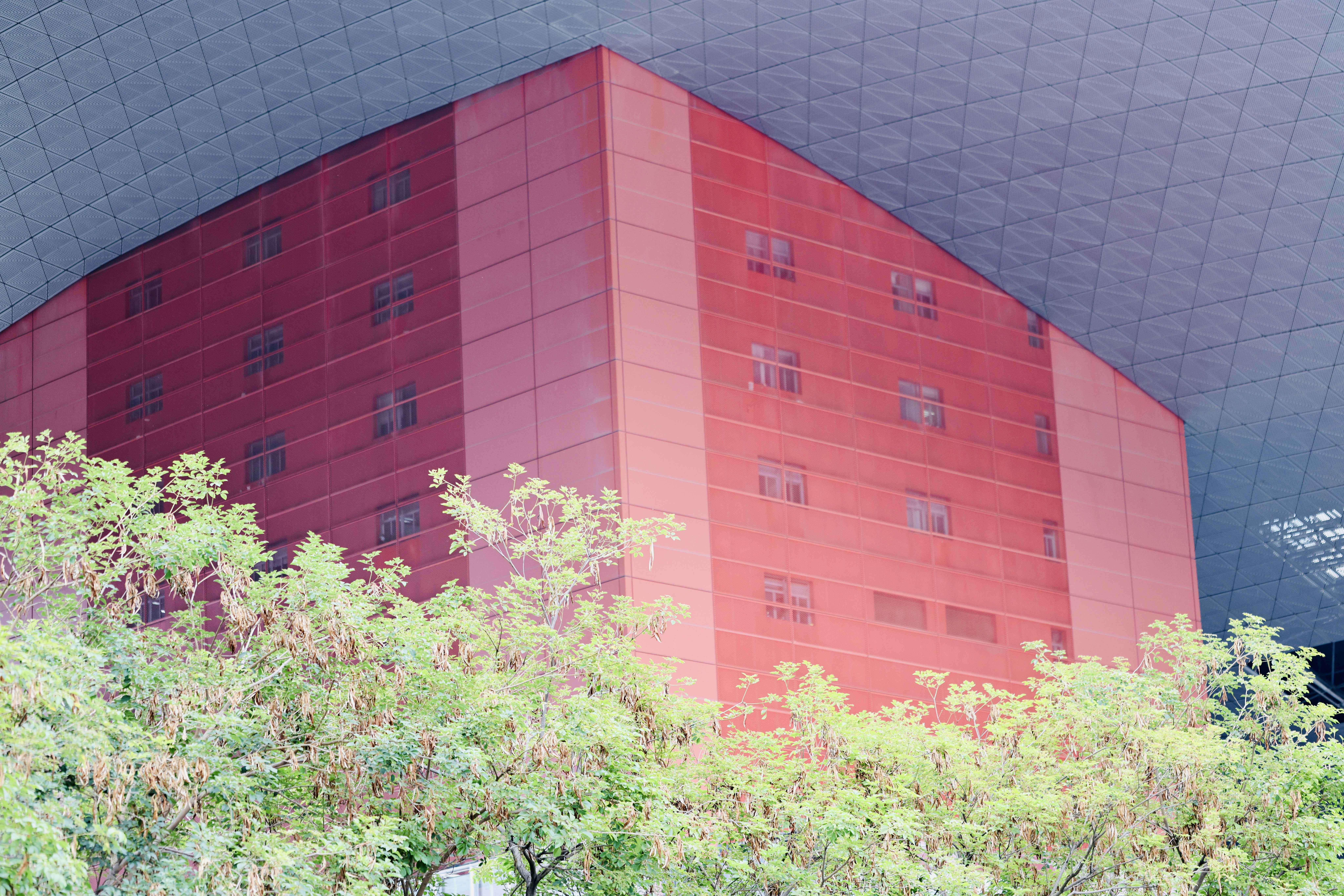 a building with a large glass wall