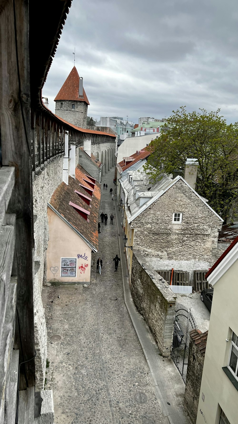 a narrow street with buildings on both sides