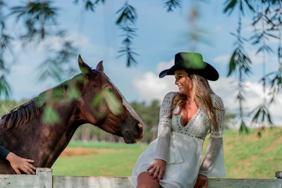 a person petting a horse