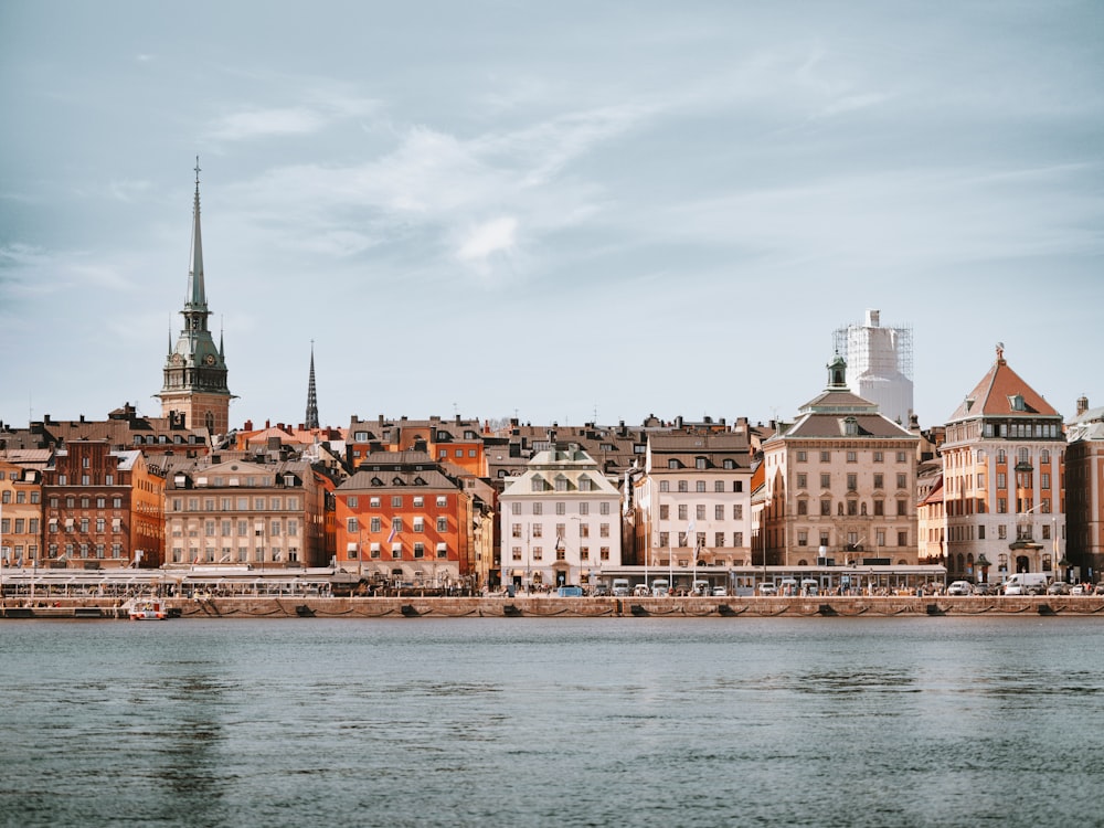 a body of water with buildings along it