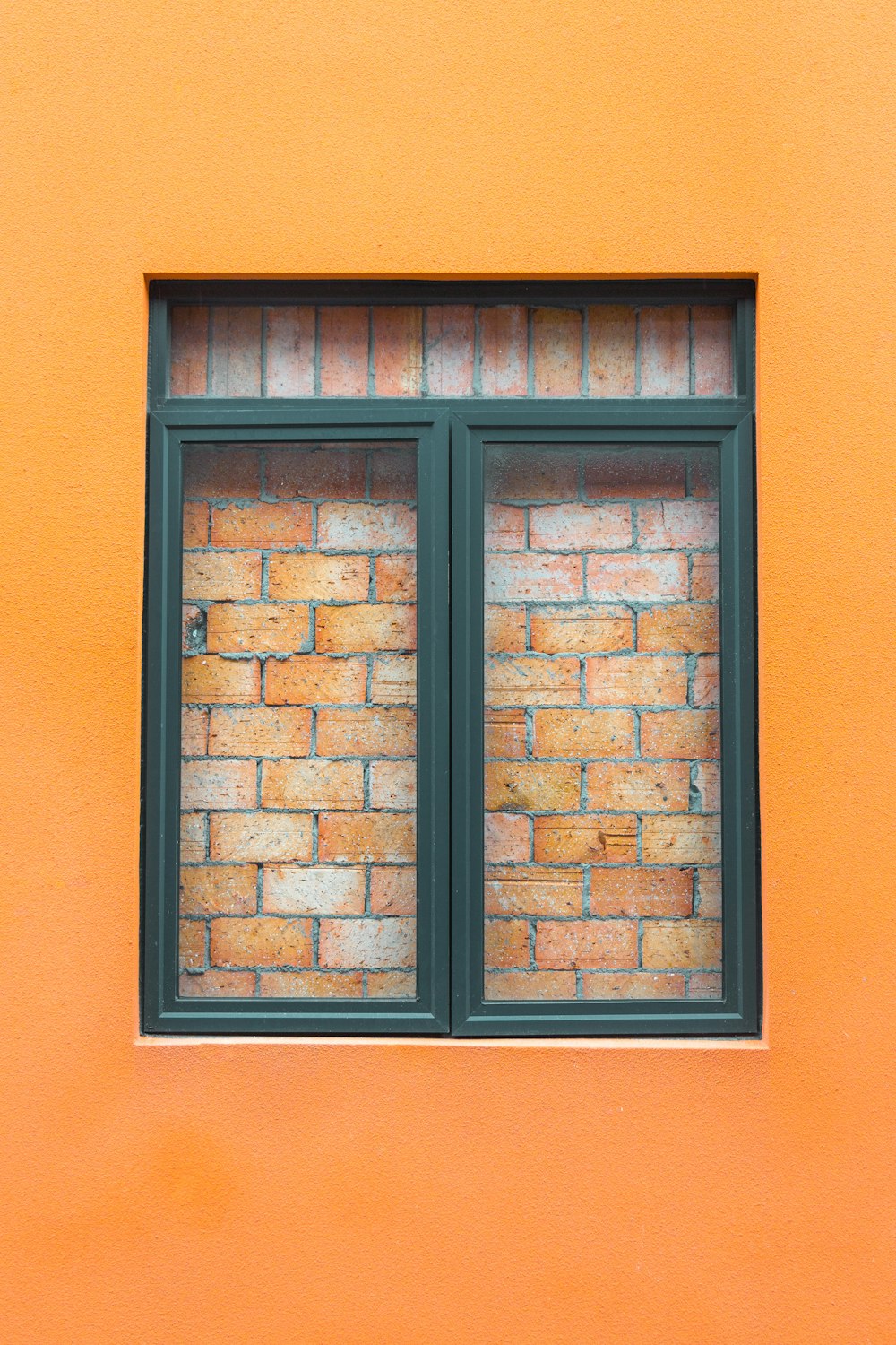 a window in a brick wall
