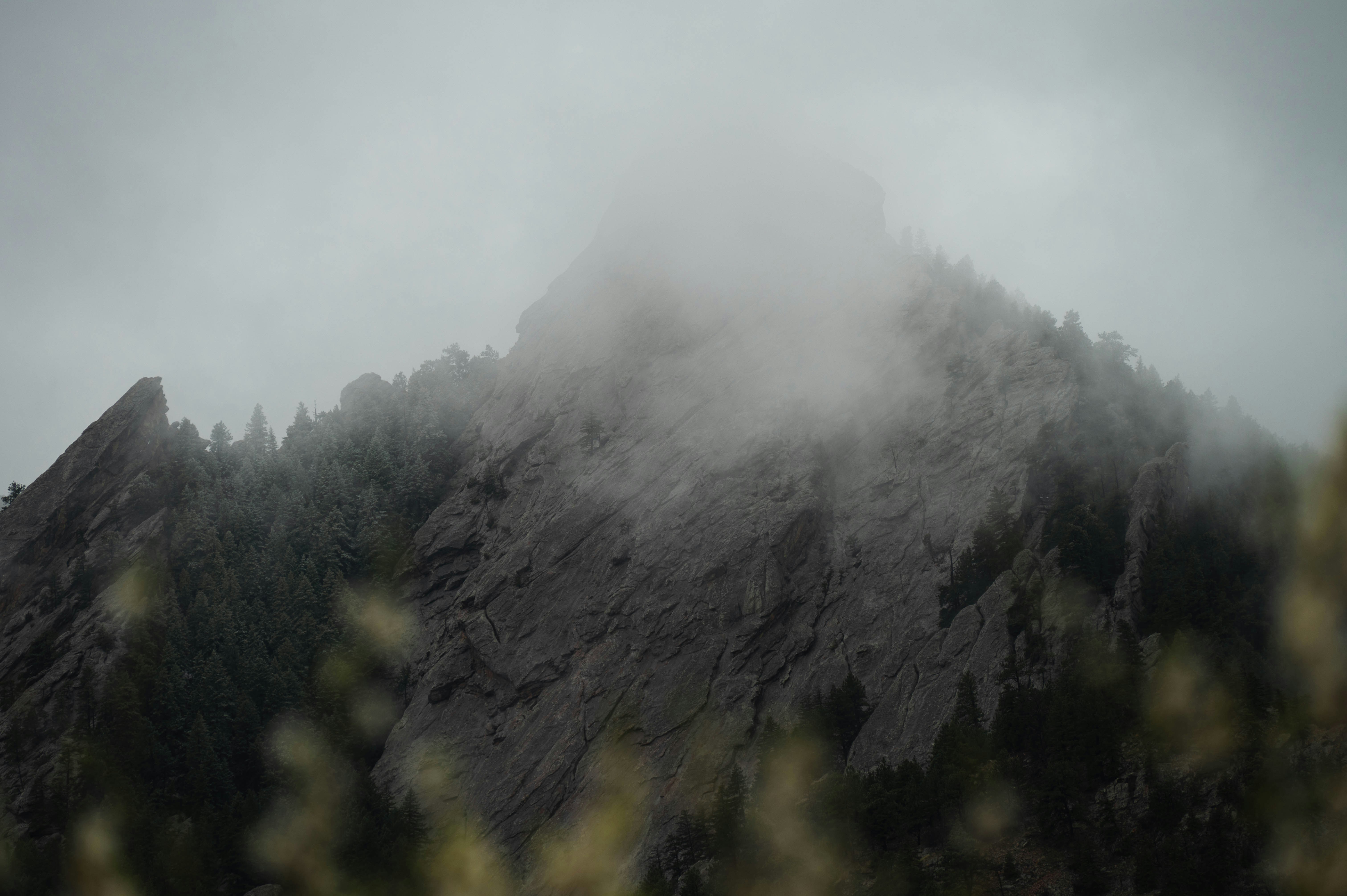 a mountain covered in fog
