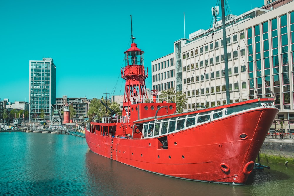 a red boat in the water