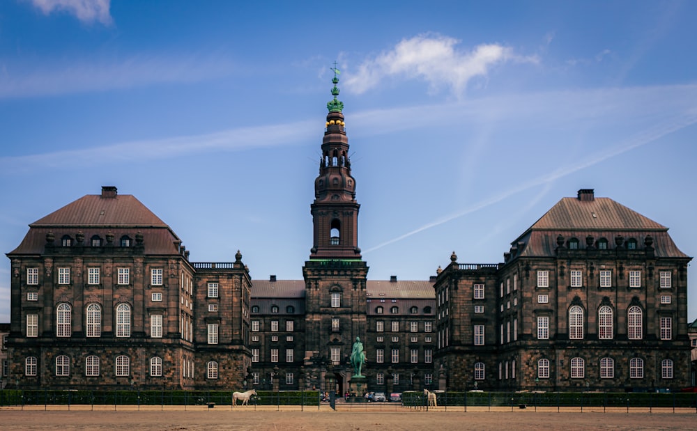 a group of buildings with Christiansborg Palace