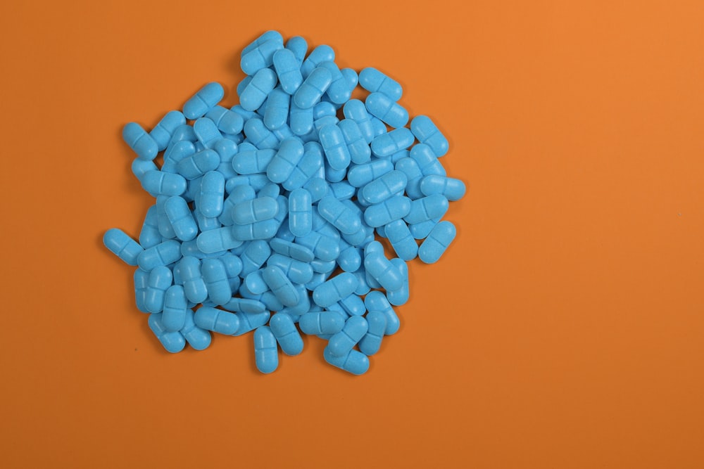 a pile of blue pills