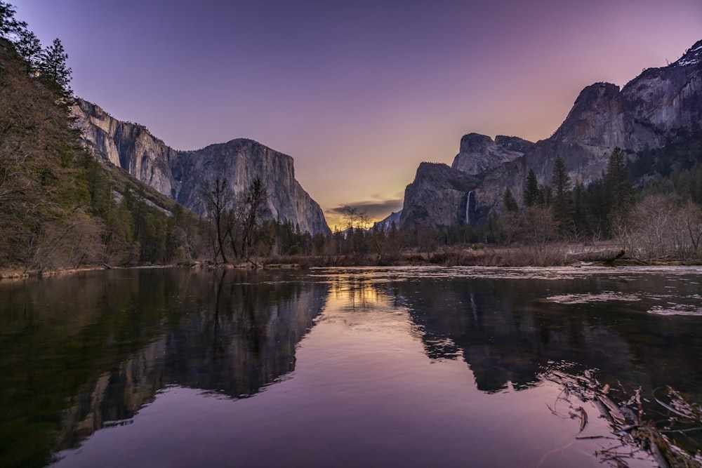 a lake surrounded by mountains