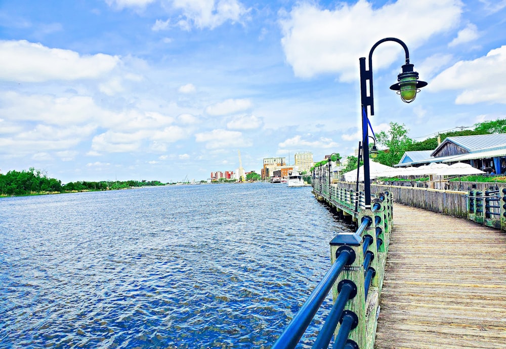 a wooden walkway over water