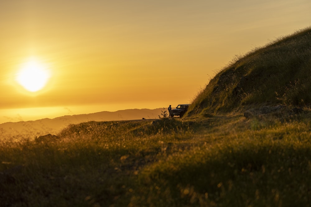 a car parked on a dirt road