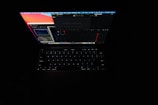 A glowing laptop screen displaying diagnostic software in a cozy home office.