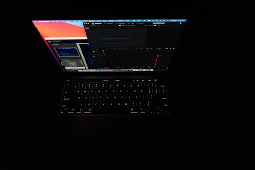 A glowing laptop screen displaying system diagnostics after a successful upgrade.