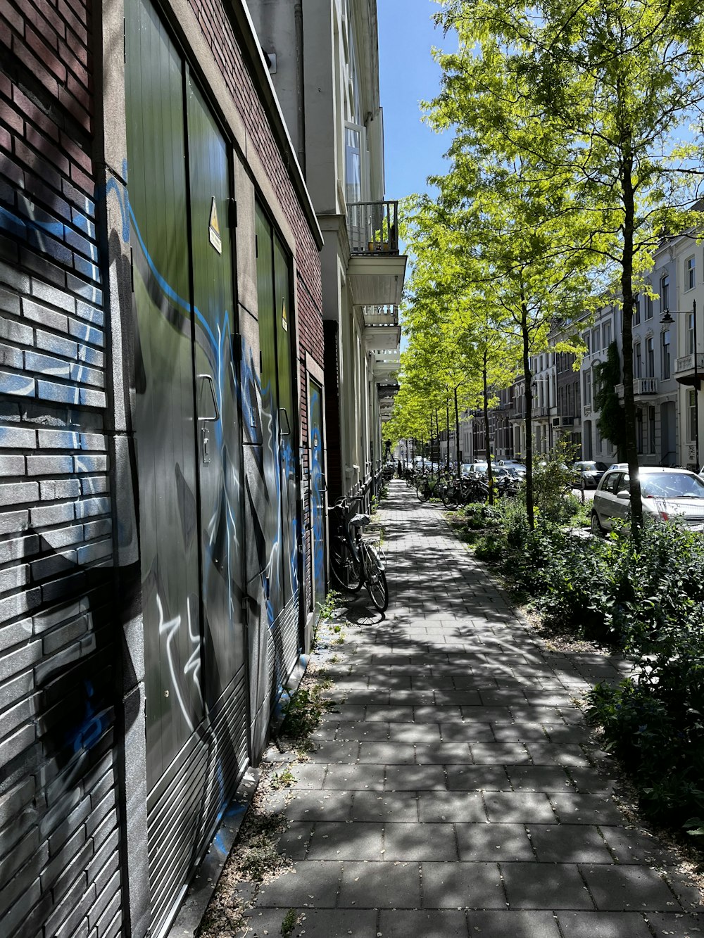 a brick walkway between buildings