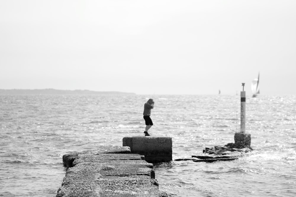 a man standing on a dock