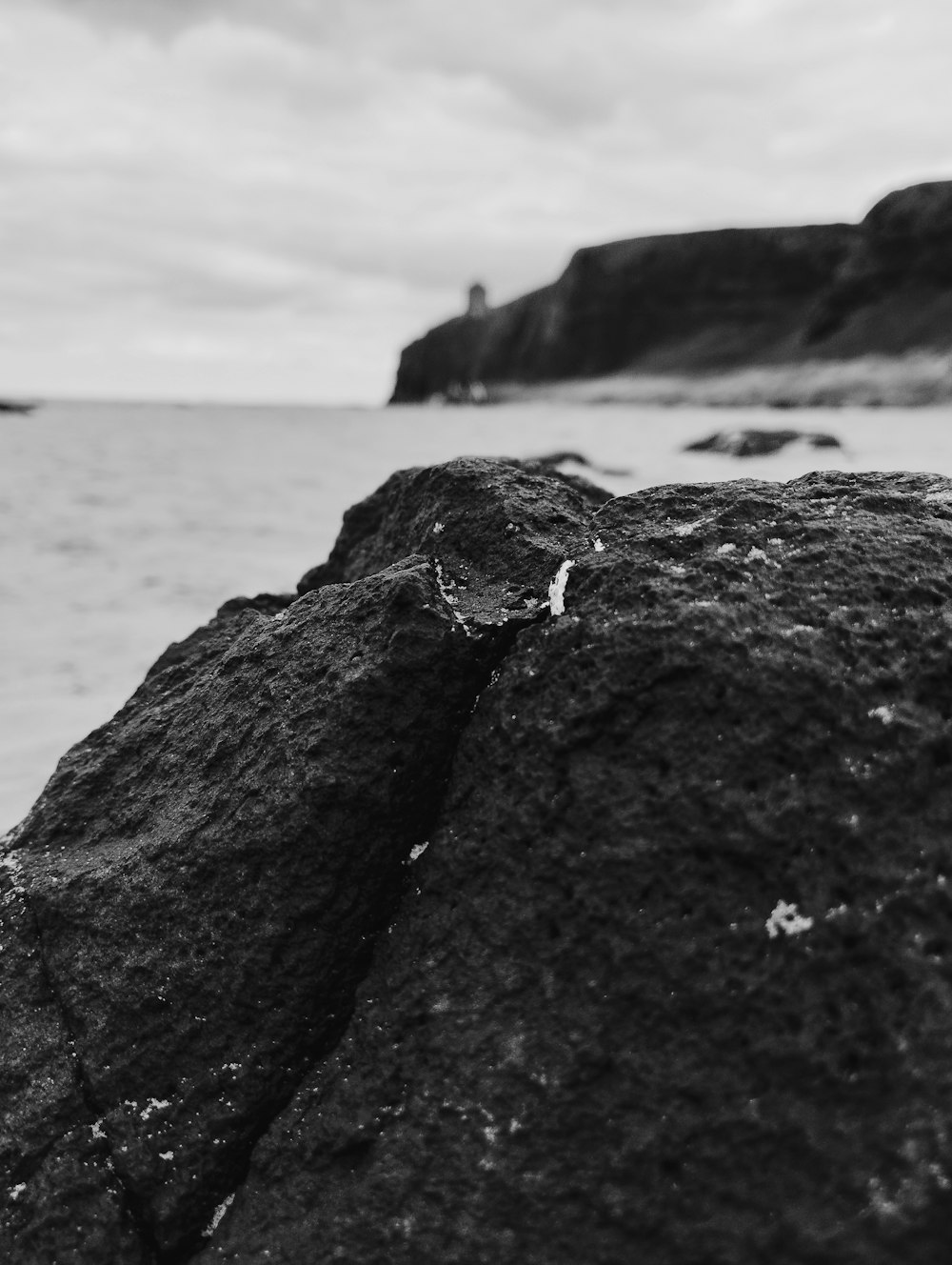 a person standing on a rock