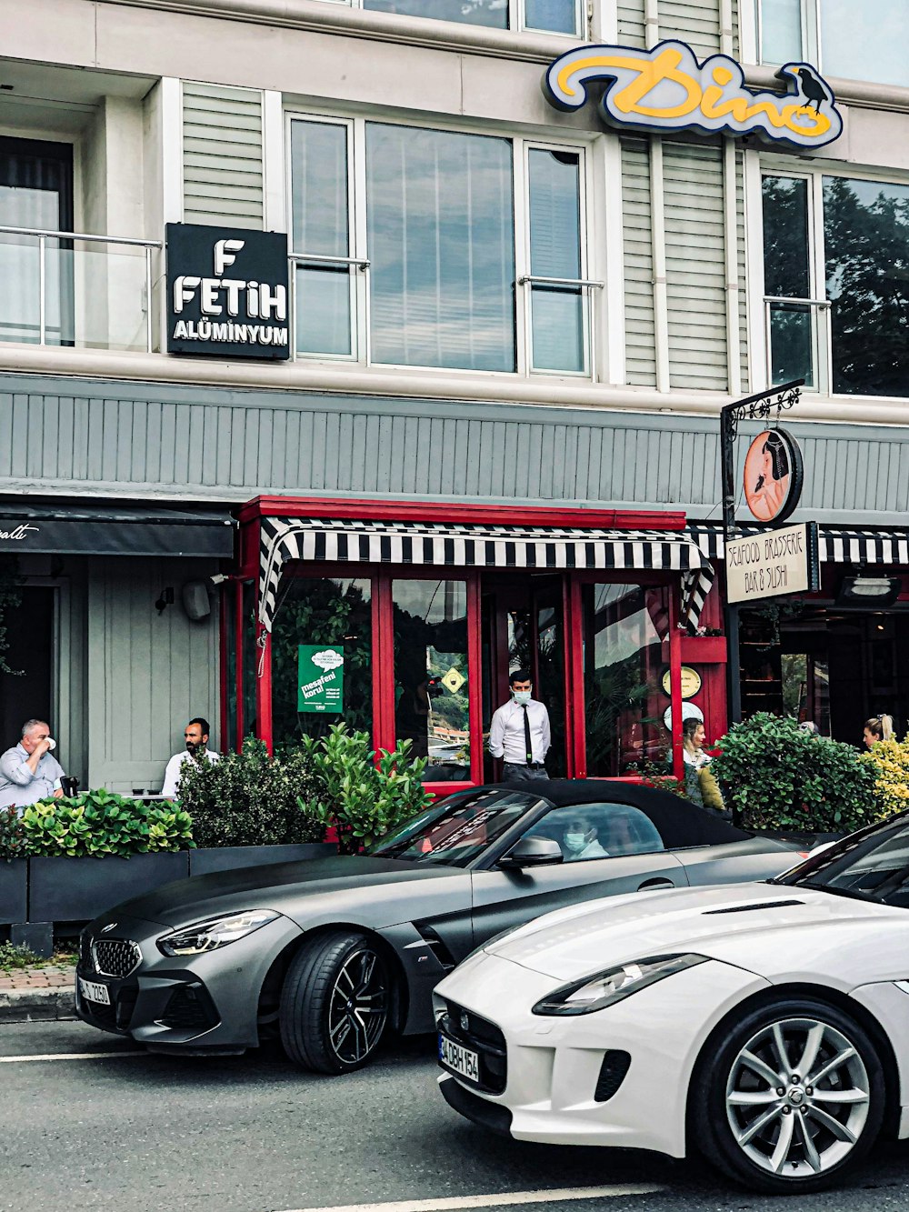 cars parked in front of a store