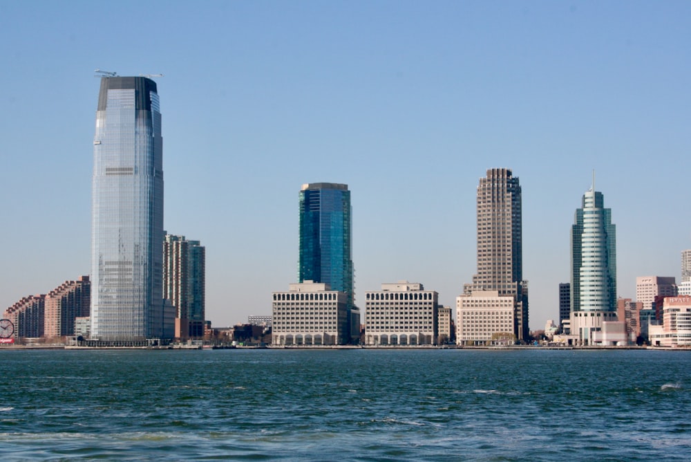 a city skyline with tall buildings