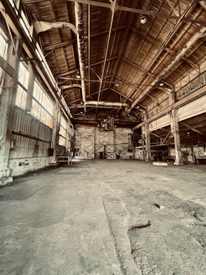 a room with a ceiling and pipes