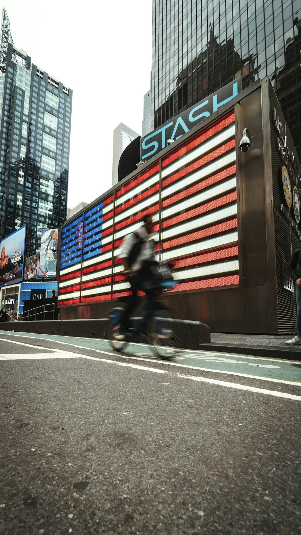 a person riding a bicycle on a street