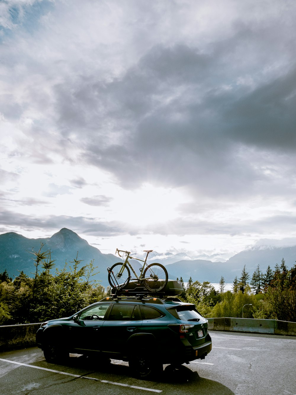 a car with bicycles on top of it