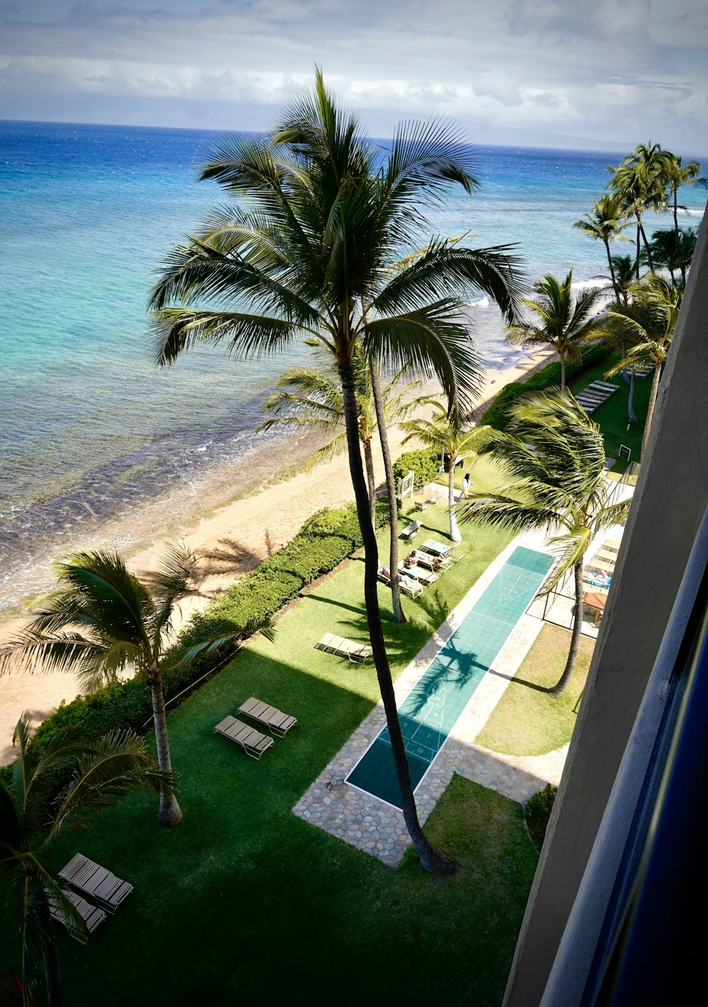 a pool next to a beach