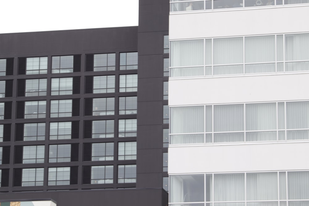 a tall building with a street sign in front of it