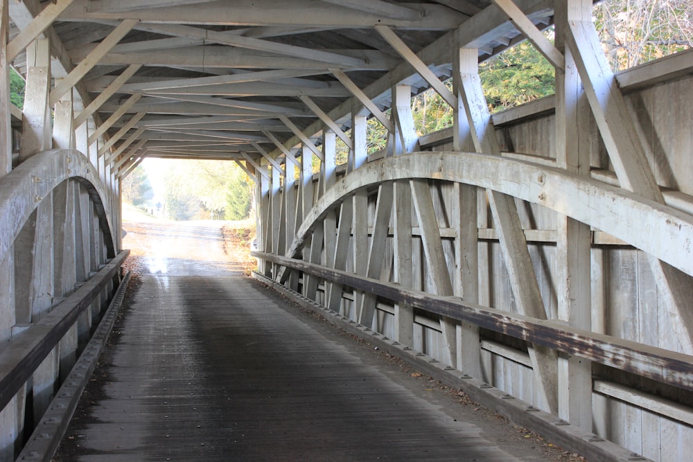 a wooden bridge over a river