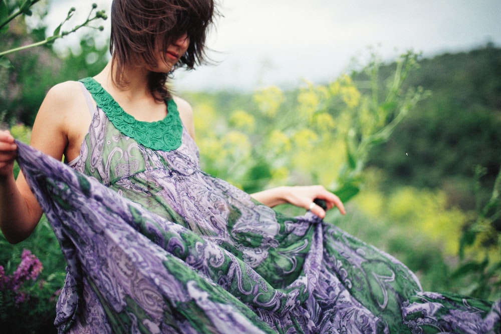 a person holding a bouquet of flowers