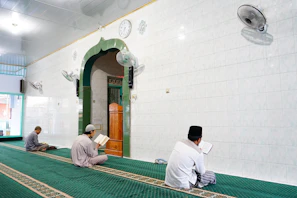 men sitting on the floor