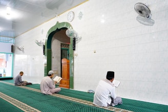 men sitting on the floor