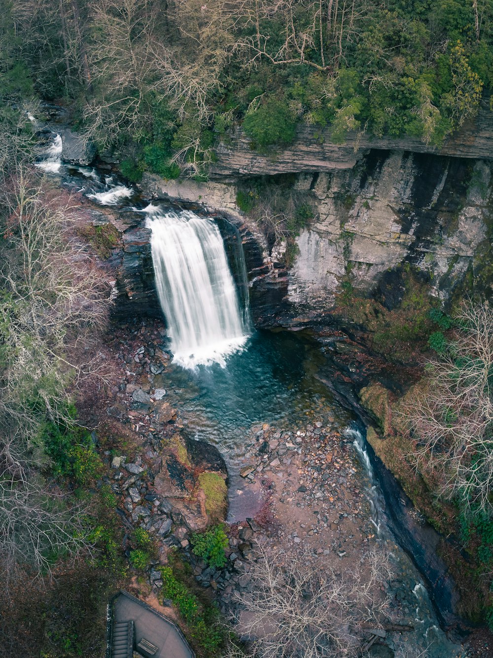 a waterfall in a forest