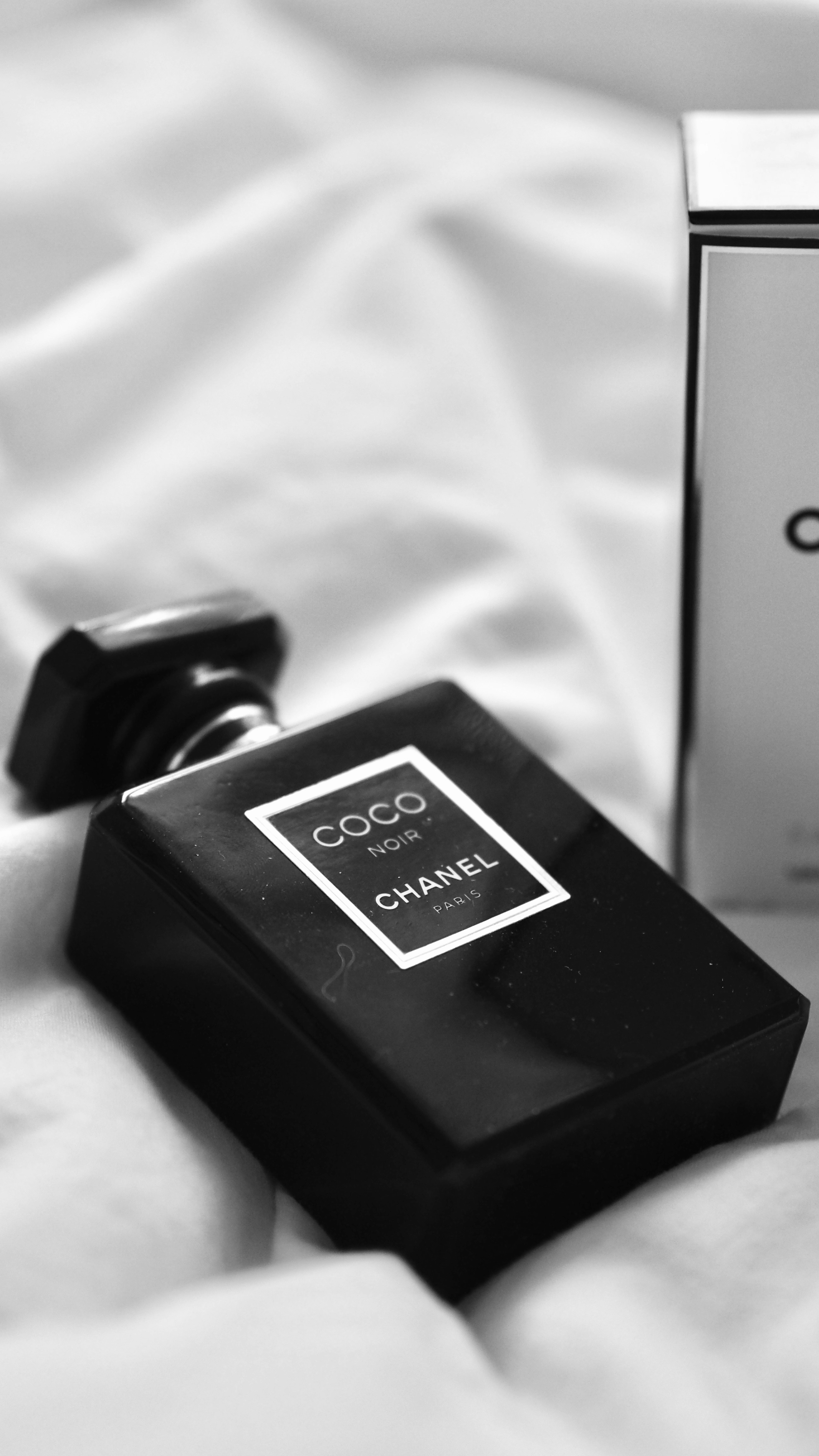a black watch on a white surface