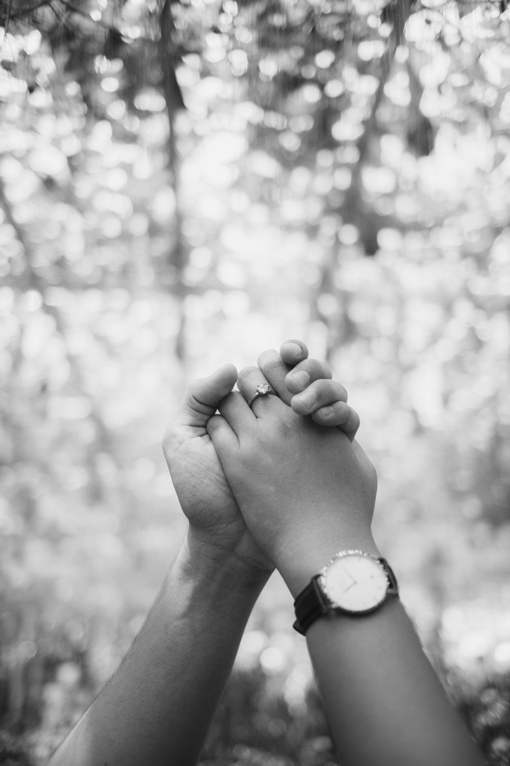 a person's hand with a watch on