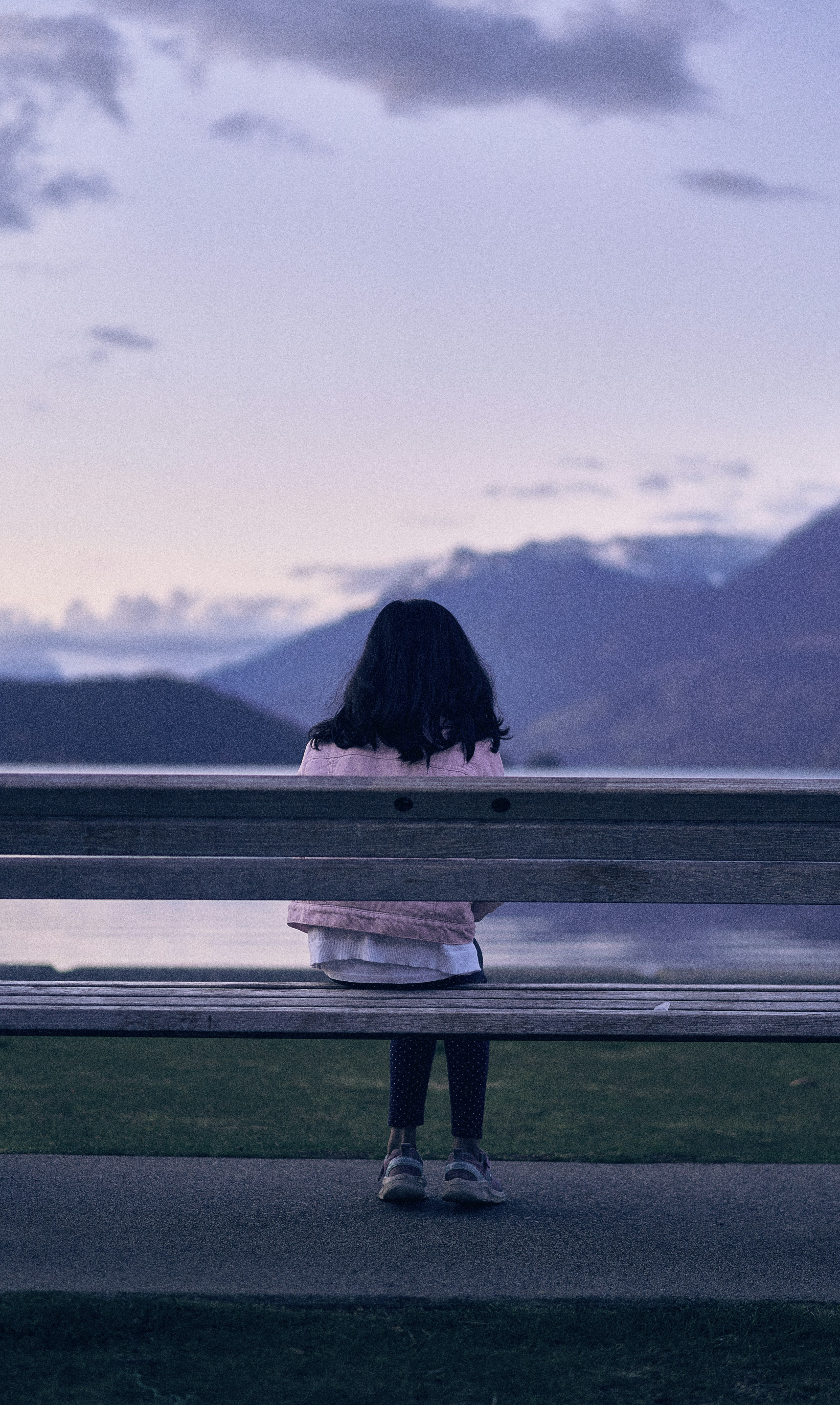 a person sitting on a bench