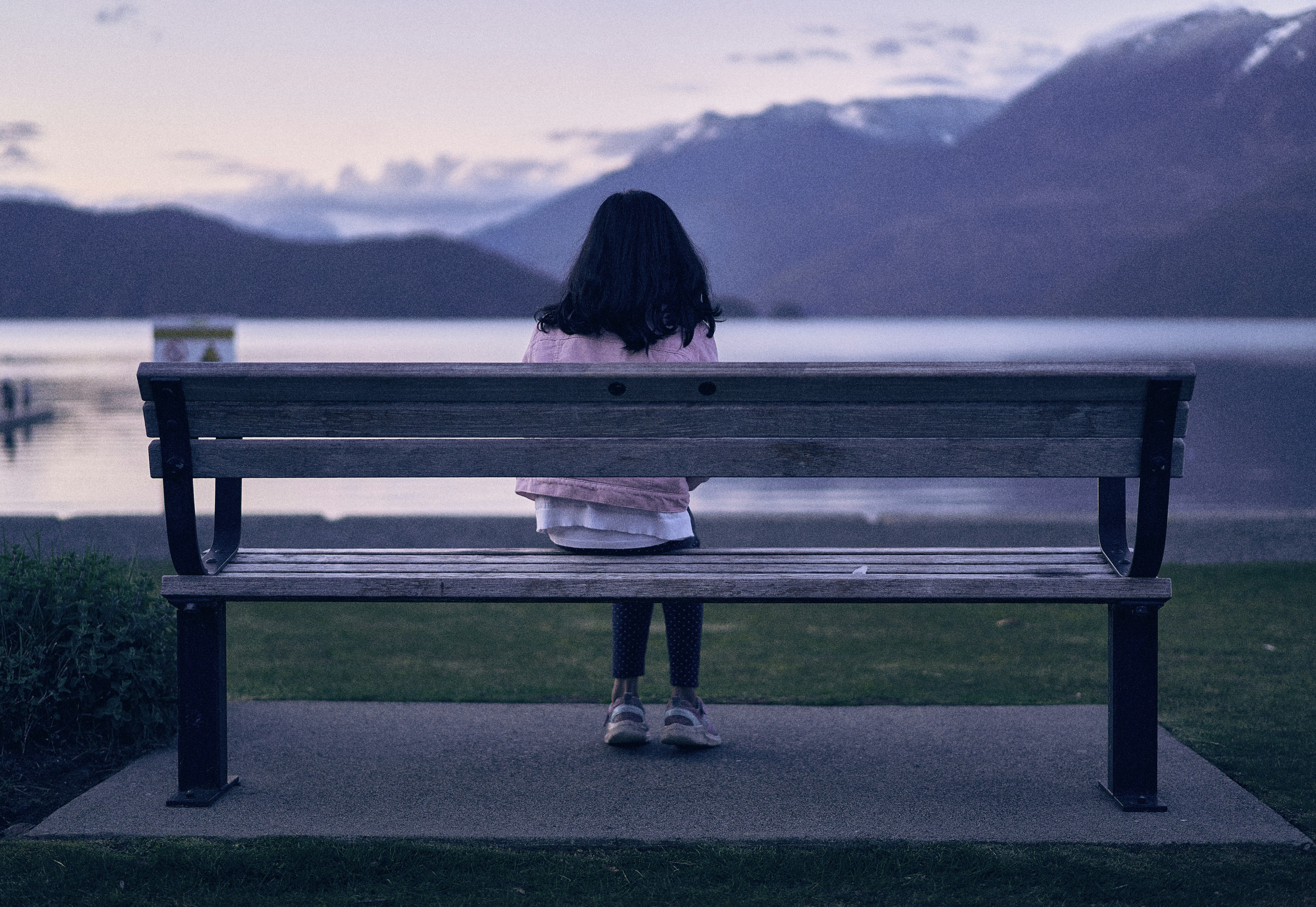a person sitting on a bench