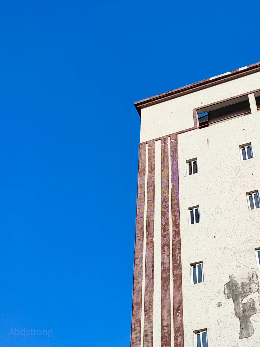 a building with a blue sky