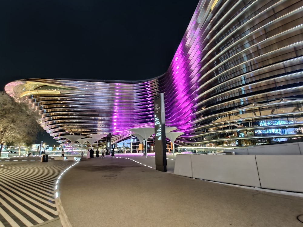 a walkway with a building in the background