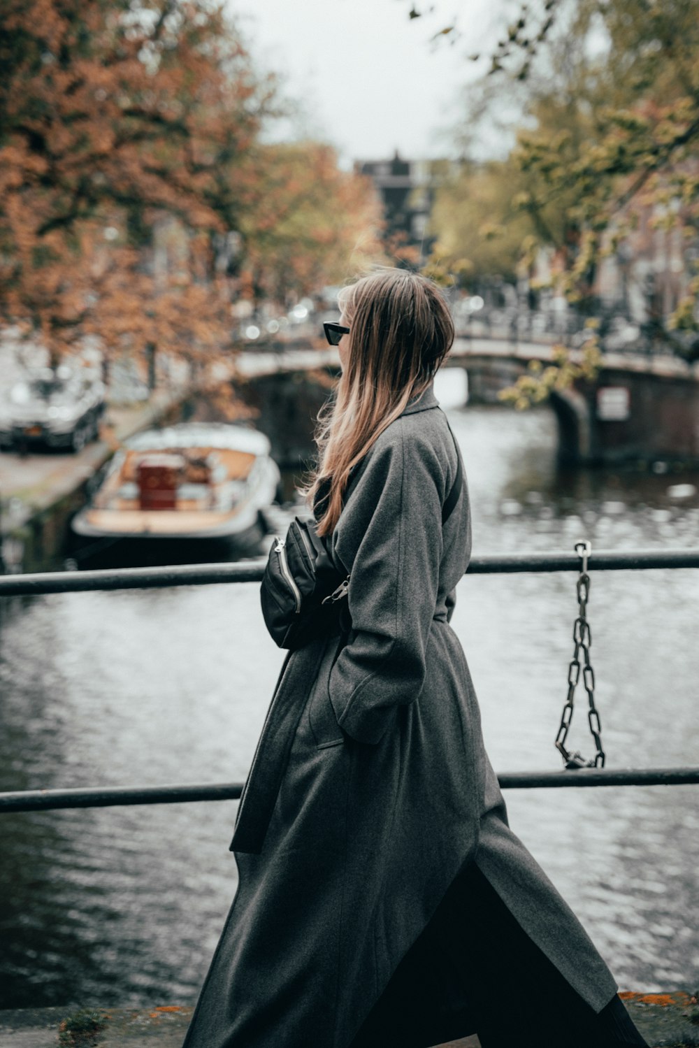 a person standing on a bridge