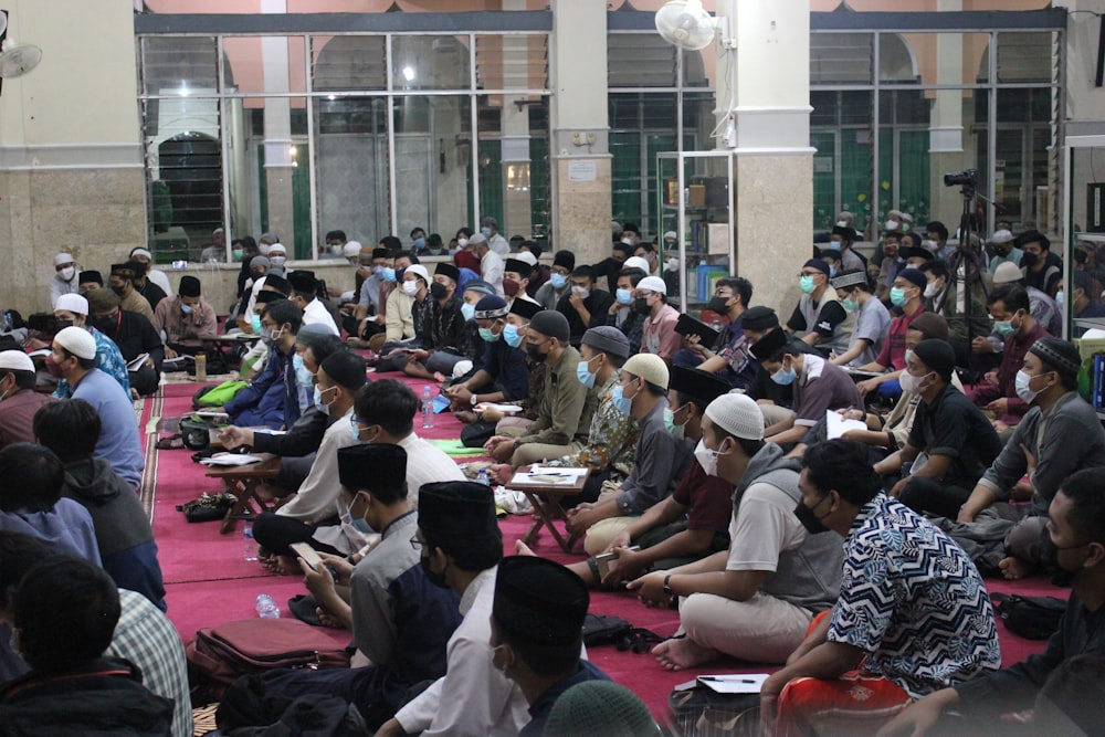 a group of people sitting outside