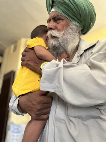 A warm image of a happy Indian family in Sultanpur, symbolizing trust and protection.