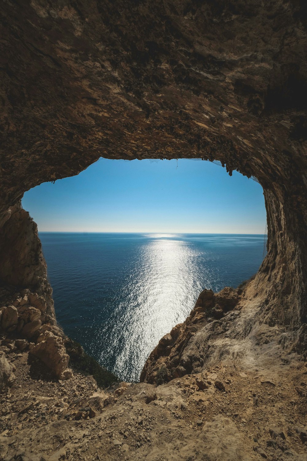 a cave with a body of water in it