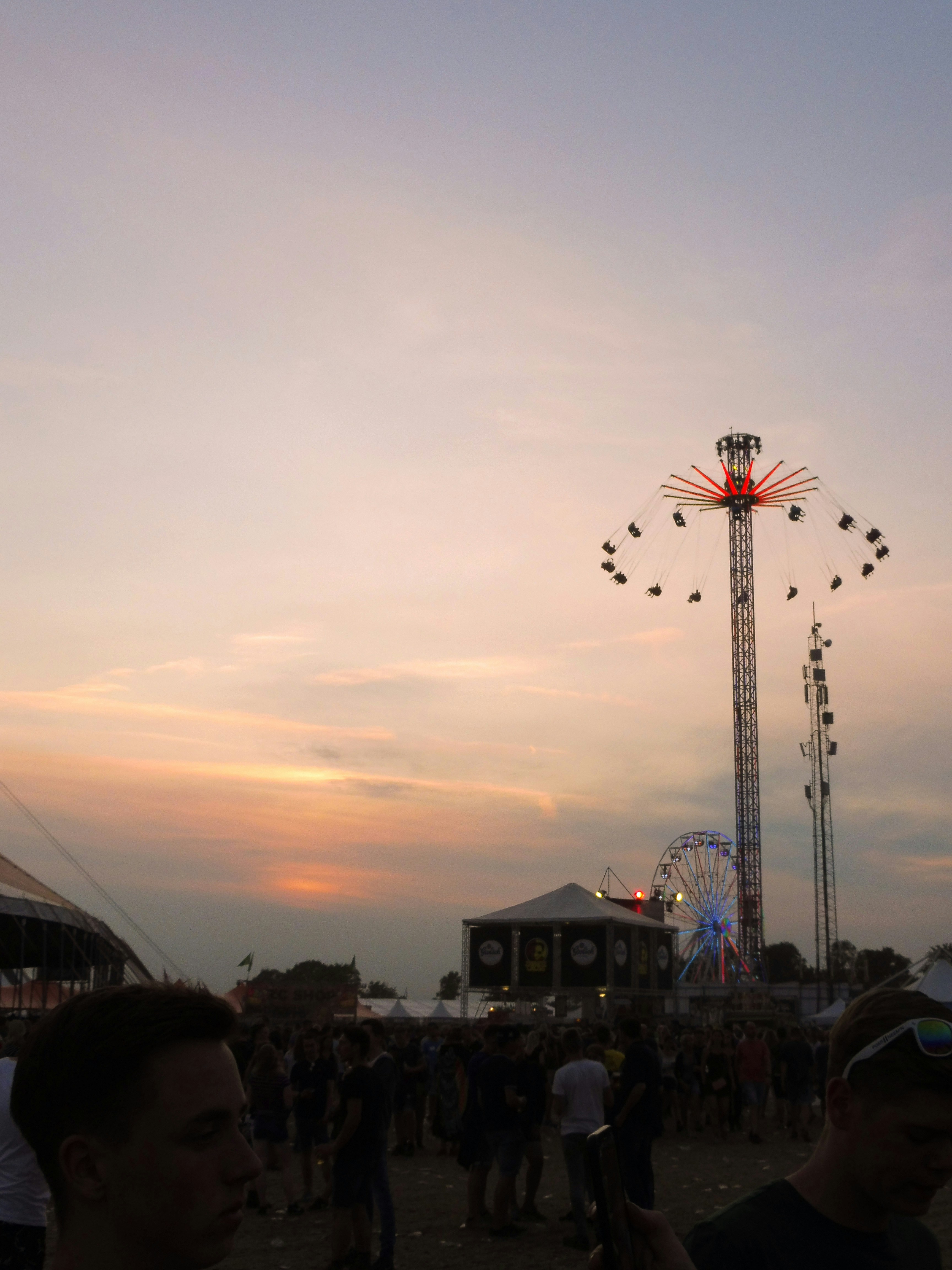 a crowd of people at a fair